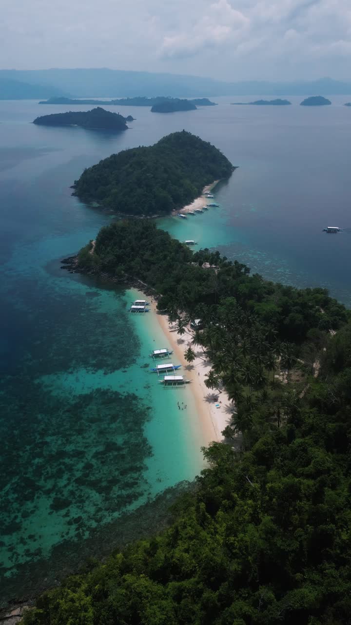 Vertical view of Exoctic Island with turquoise water in Palawan, Phillippines. Aerial view.