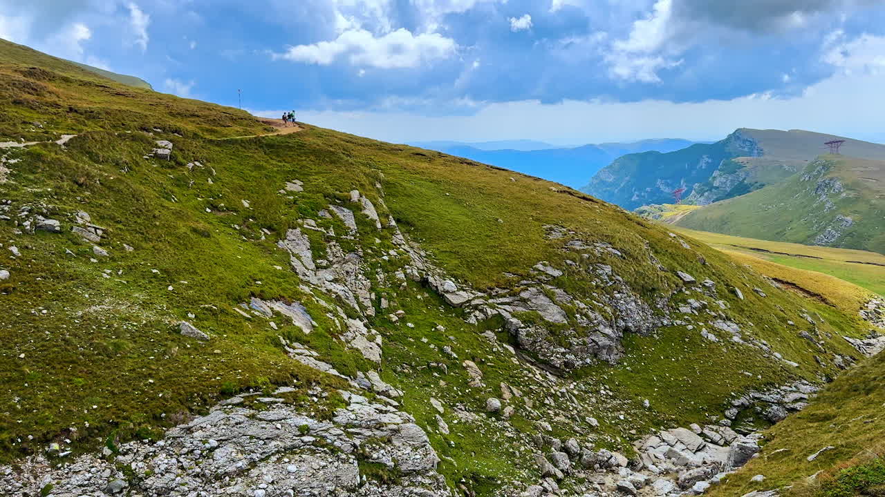 Heroes Cross monument on Caraiman Peak. The metal structure stands atop the steep mountain cliff