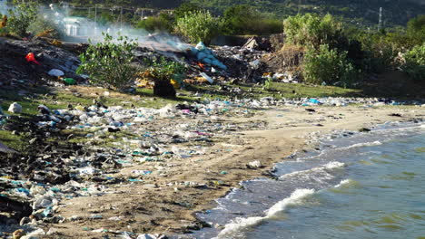 dirty polluted beach shore full of ocean plastic trash