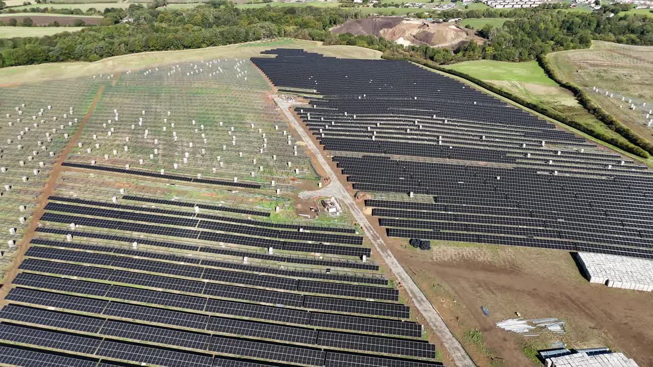 Birds eye view drone aerial Rows of solar farm renewable energy panels photovoltaic green grid sustainable clean power plant eco natural resources