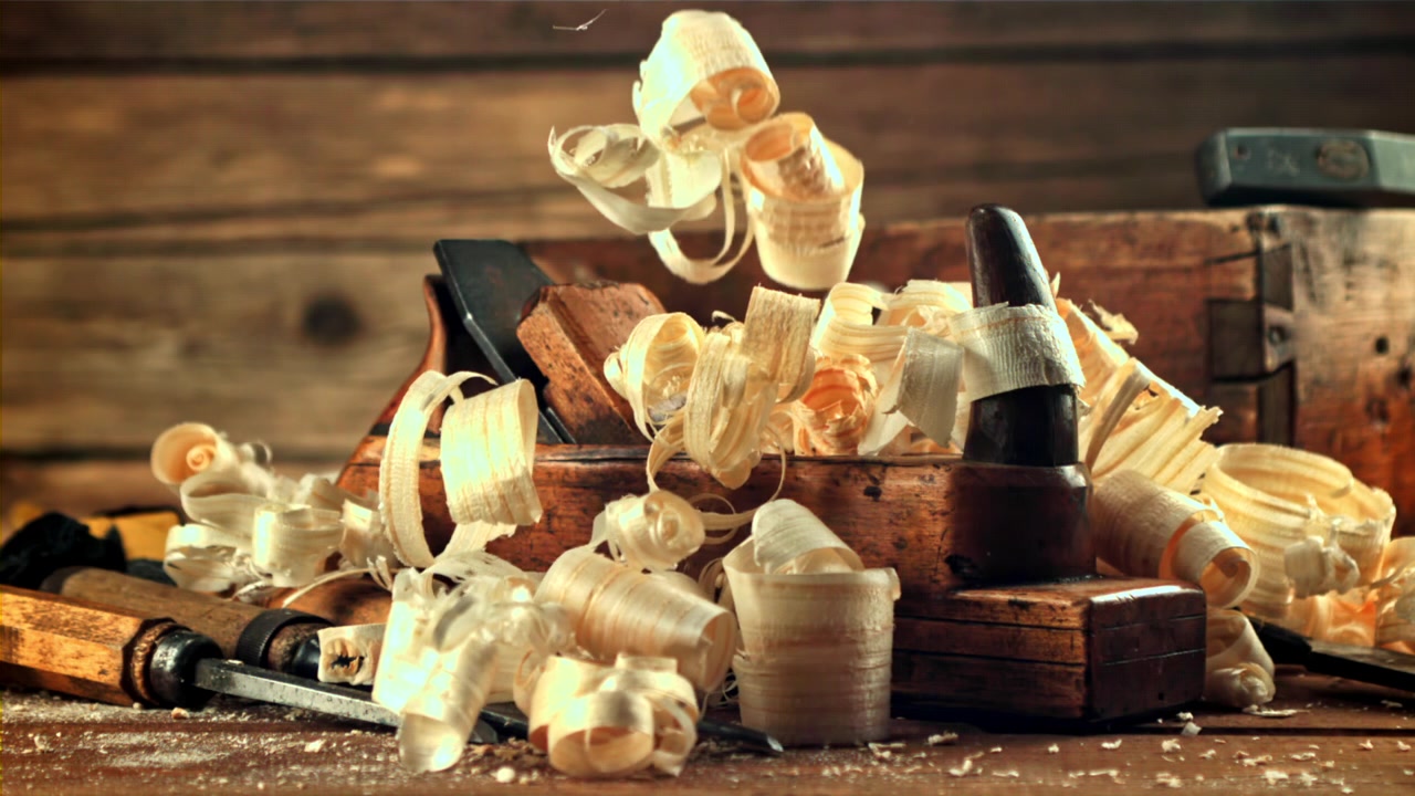 Slow Motion Wood Shavings Falling on Vintage Woodworking Tools