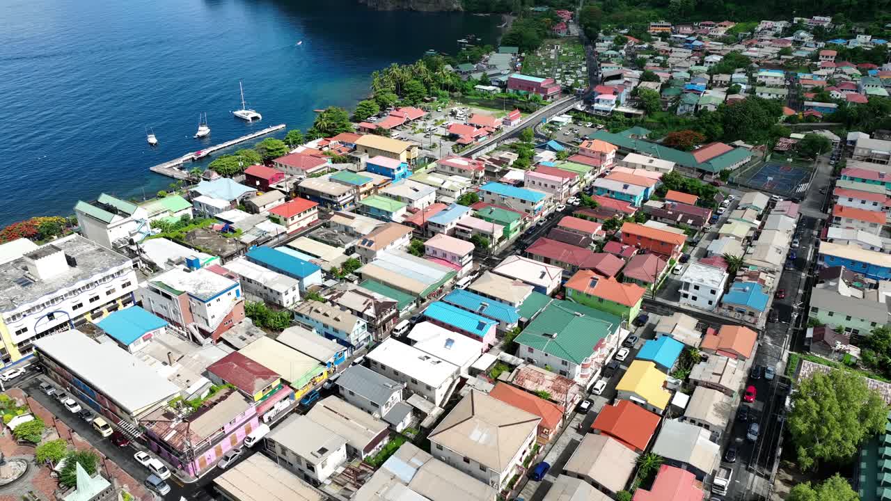 Aerial View of a Vibrant Coastal Town with Colorful Houses and Bay