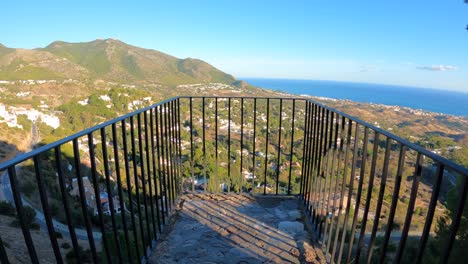 view of a huge, inhabited valley by the sea