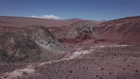 Aerial-of-mountain-rocks-in-Rainbow-Valley,-Chile