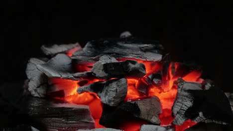 glowing embers of a charcoal fire