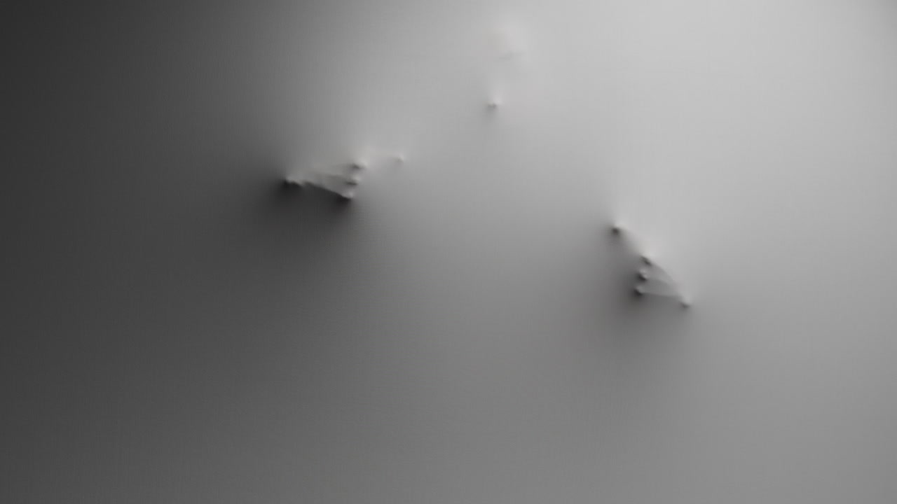 A scary silhouette of a woman appears from the white wall