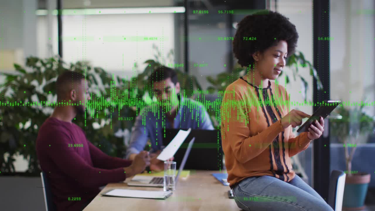 Woman tapping tablet starting waveform for analysis colleagues reviewing docs business meeting