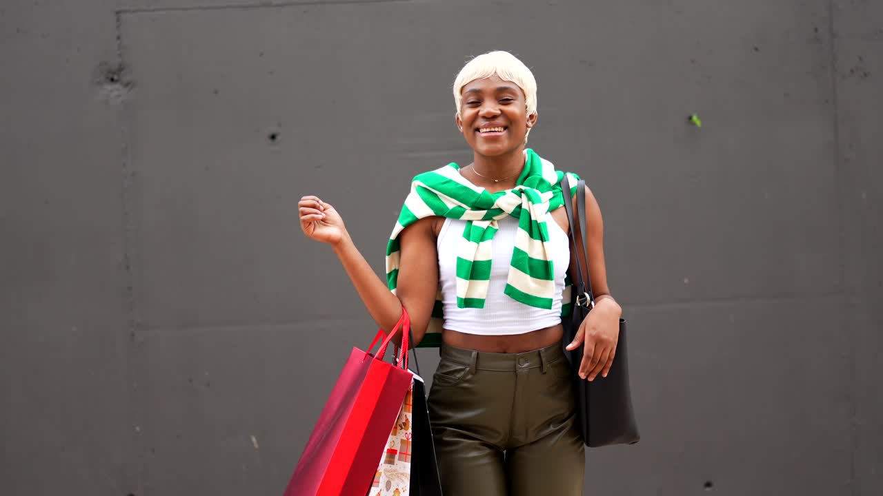 Stylish woman with shopping bags
