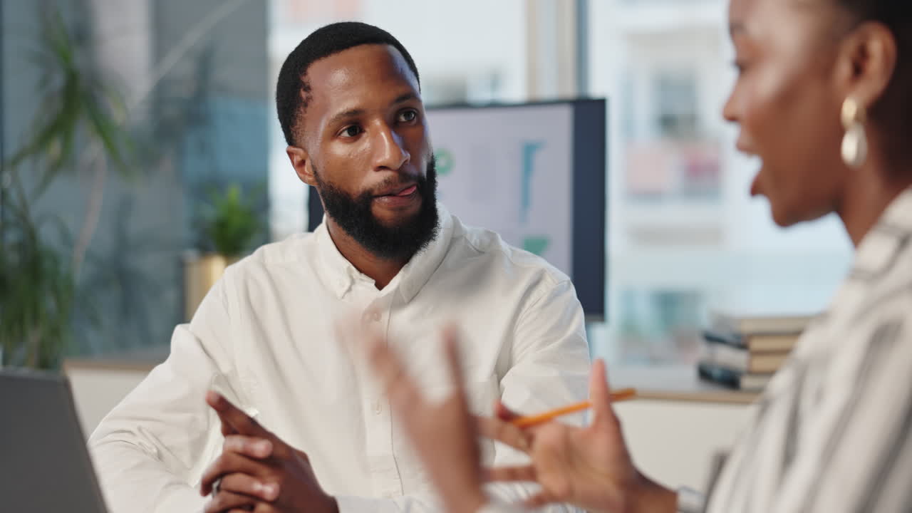 Two business professionals in a meeting