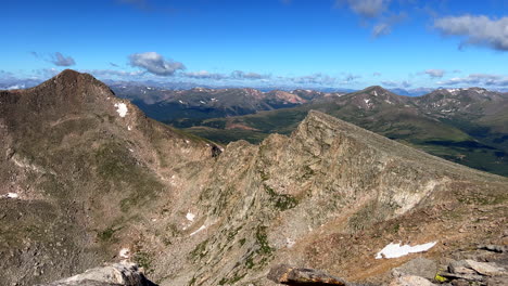 Mount-Blue-Sky-Evans-fourteener-high-elevation-peak-mountaineering-hike-hiking-adventure-Rocky-Mountains-Continental-Divide-summer-sunny-blue-bird-high-elevation-above-alpine-landscape-pan-left