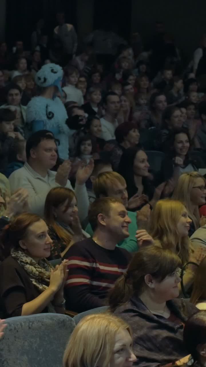 Audience enjoying a theater performance