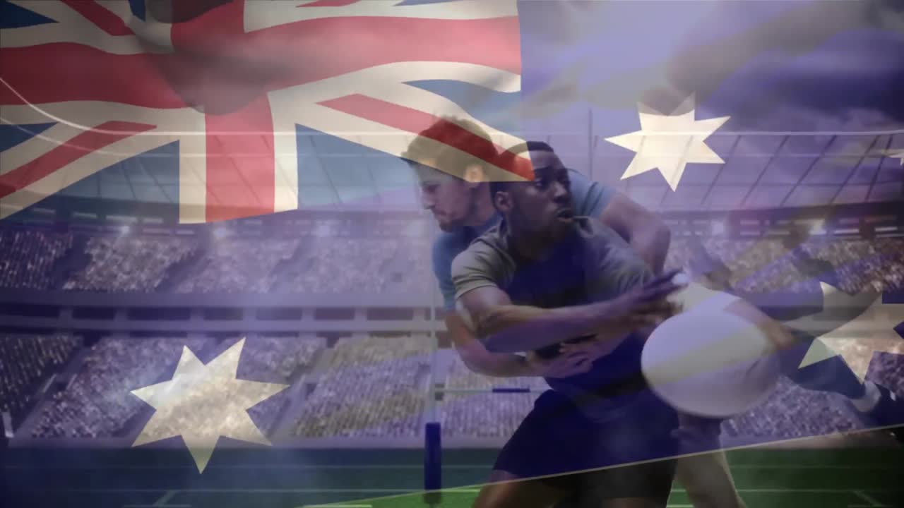 럭비 선수 가 선수 에 의해 타클 을 당하는 동안 공 을 던지고 있다