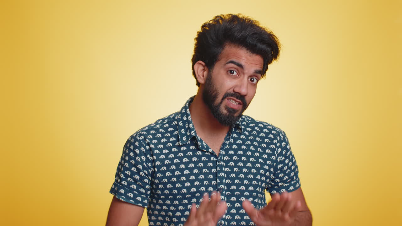 Indian man saying no be careful scolding and giving advice to avoid danger disapproval sign