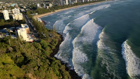 Close-forwards-aerial-over-the-North-side-of-Burleigh-Heads,-Gold-Coast,-Australia