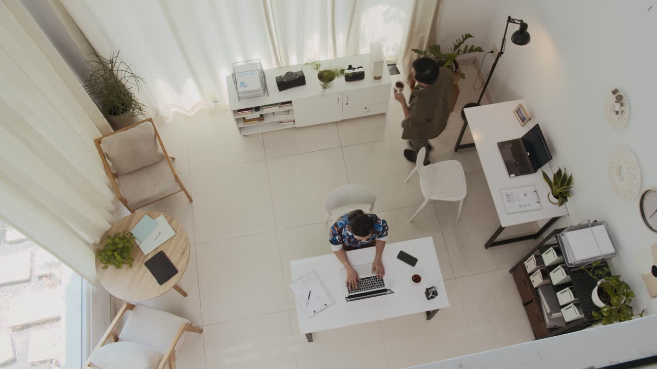Entrepreneurs Coworking in Modern Office Space Top View