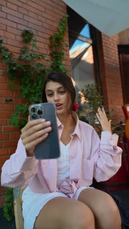 woman making a video call outdoors