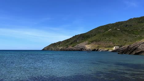 Seafront-isolated-house-built-on-rocks-of-Corsica-island-in-France