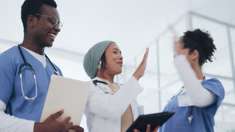 Doctors,-tablet-or-high-five-in-success