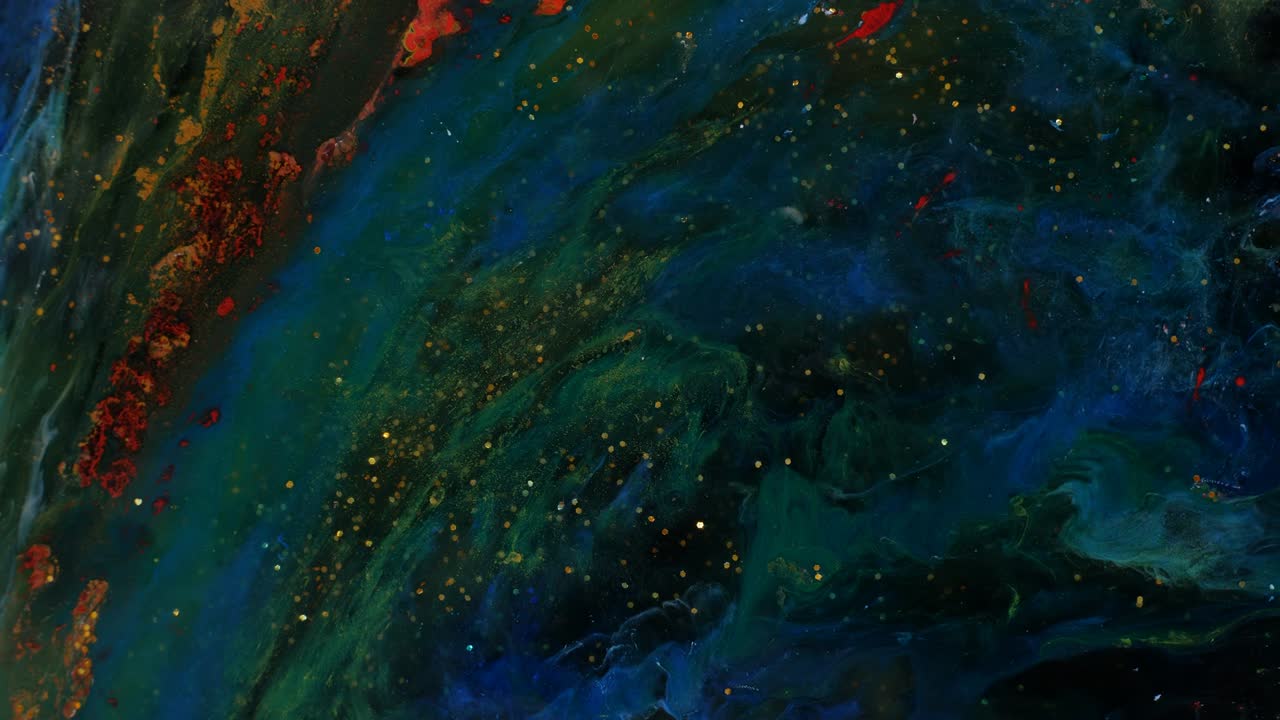 Blue and green smoke spreads in veins on a golden shimmering background. Multi-level texture, transparency. Resin art. Fluid art. Liquid abstractions. Deep ink spaces. Moving abstract colorful background.