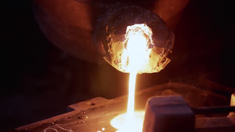 liquid iron molten metal pouring in container, industrial metallurgical factory, foundry cast, heavy industry