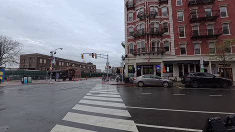 hoboken new jersey bus terminal on a rainy day with wet roads and grey, cloudy skies