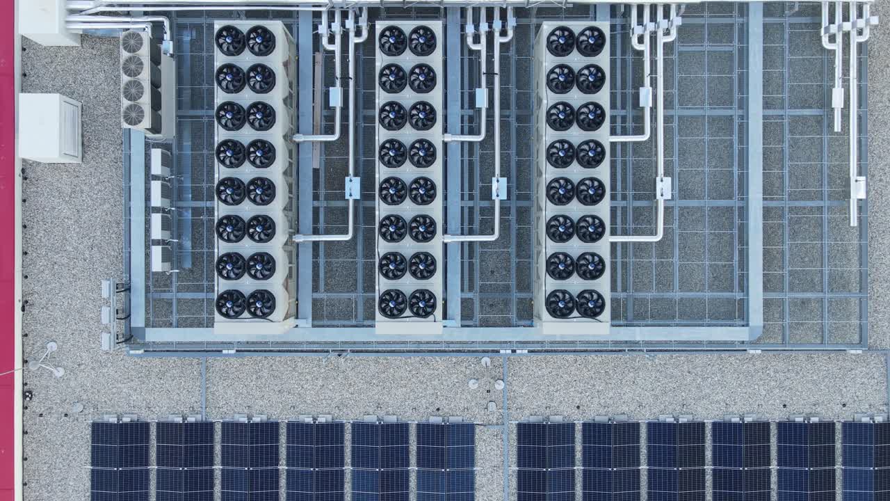 Air vents on the roof on top of a Data storage center facility - Aerial view