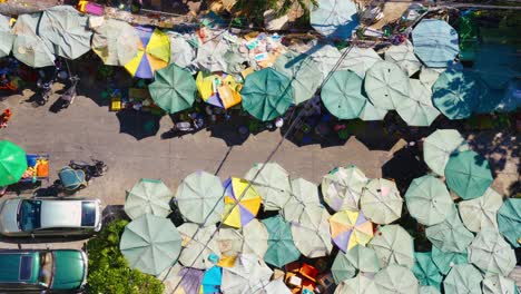 directly above a traditional neighborhood asia food market vendors