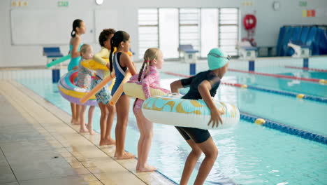 children having fun in a swimming pool