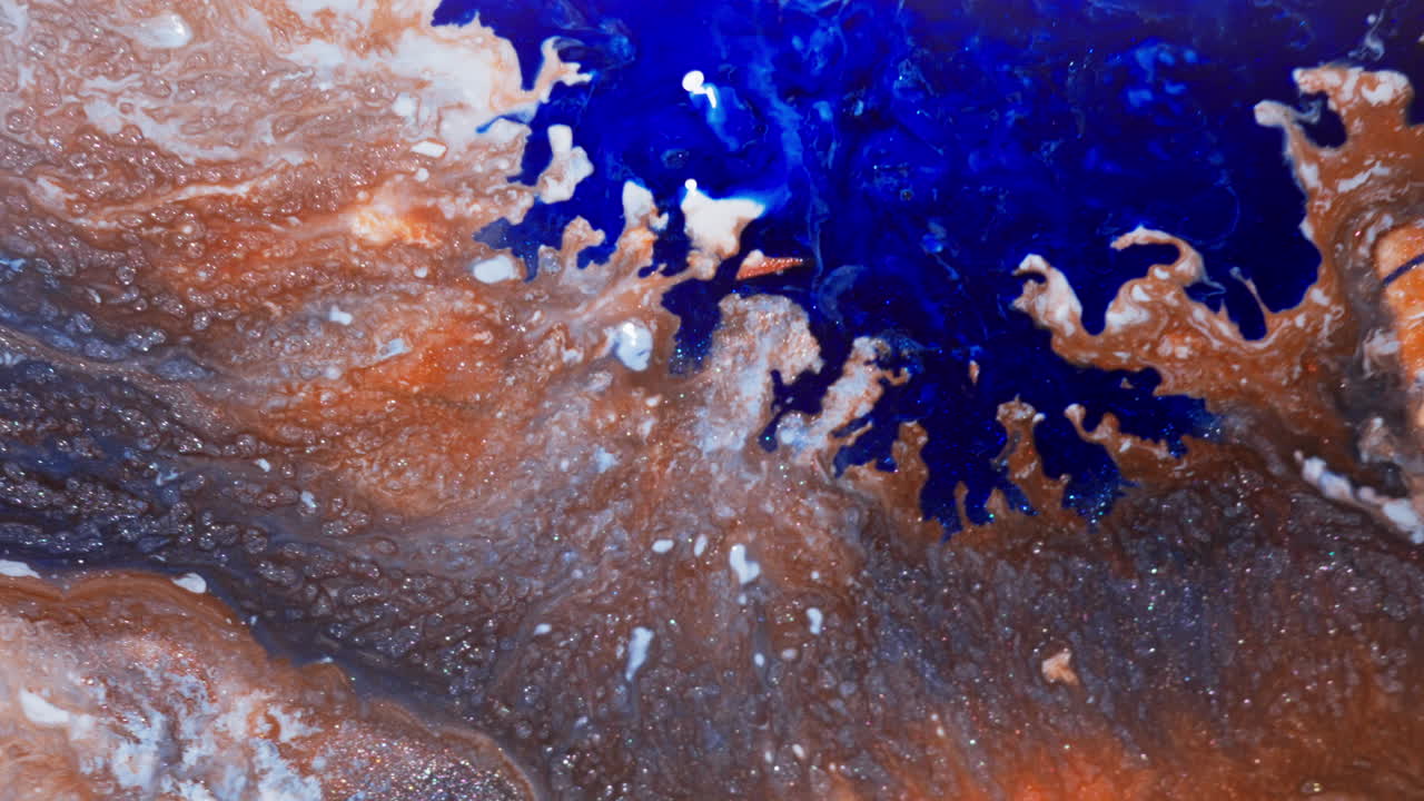 Closeup Of Glittery Ink Forming A Fractal Pattern Perfect For Background