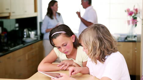 Serious-siblings-using-a-tablet-computer