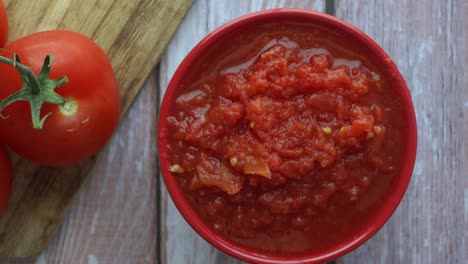 homemade tomato sauce in a red bowl