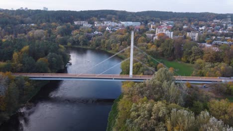 aerial orbiting shot of a suburban district å½vä—rynas in vilnius, lithuania with autumn foliage in october