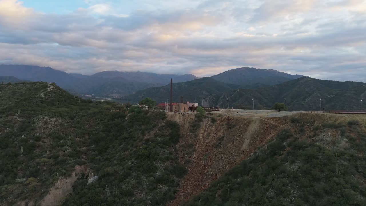 Cenital drone view of Estación 2 Cable Carril’s red-roofed buildings and mining ruins in Chilecito, La Rioja, Argentina