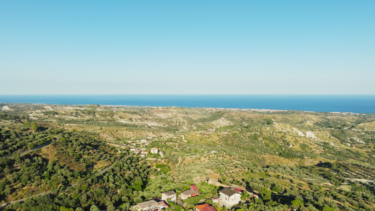 Calabrian Landscape with Trees and Crops in Summer Near the Sea Aerial