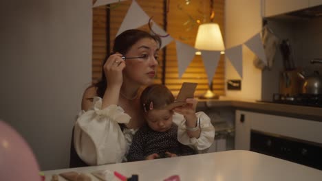 mother and daughter getting ready for a birthday party