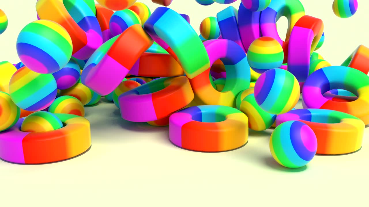 esferas y tori arco iris de colores formas geométricas lgbt caen a la superficie. imágenes de portada minimalista 4k