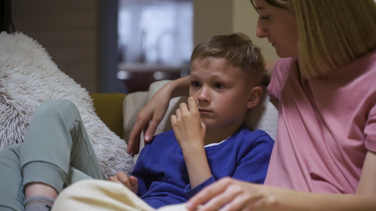 Family enjoying movie