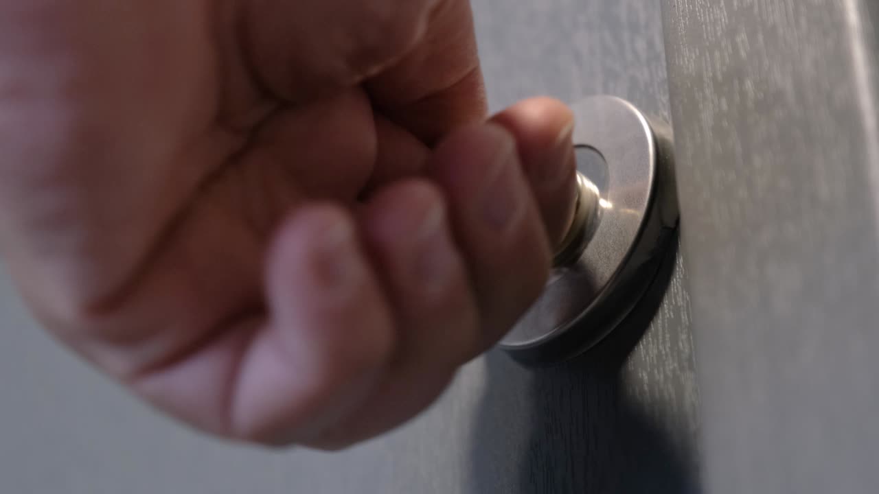 Opens The Door Using The Key