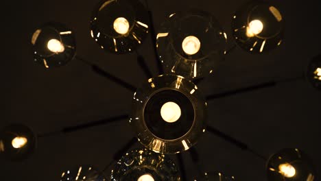 different shots of cool lights in hotel lobby giving a moody, modern and luxurious vibe