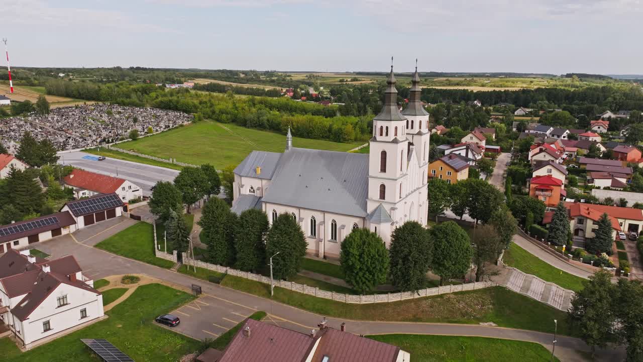 Drone orbit reveals Roman Catholic Church of Transfiguration in Piatnica, Poland