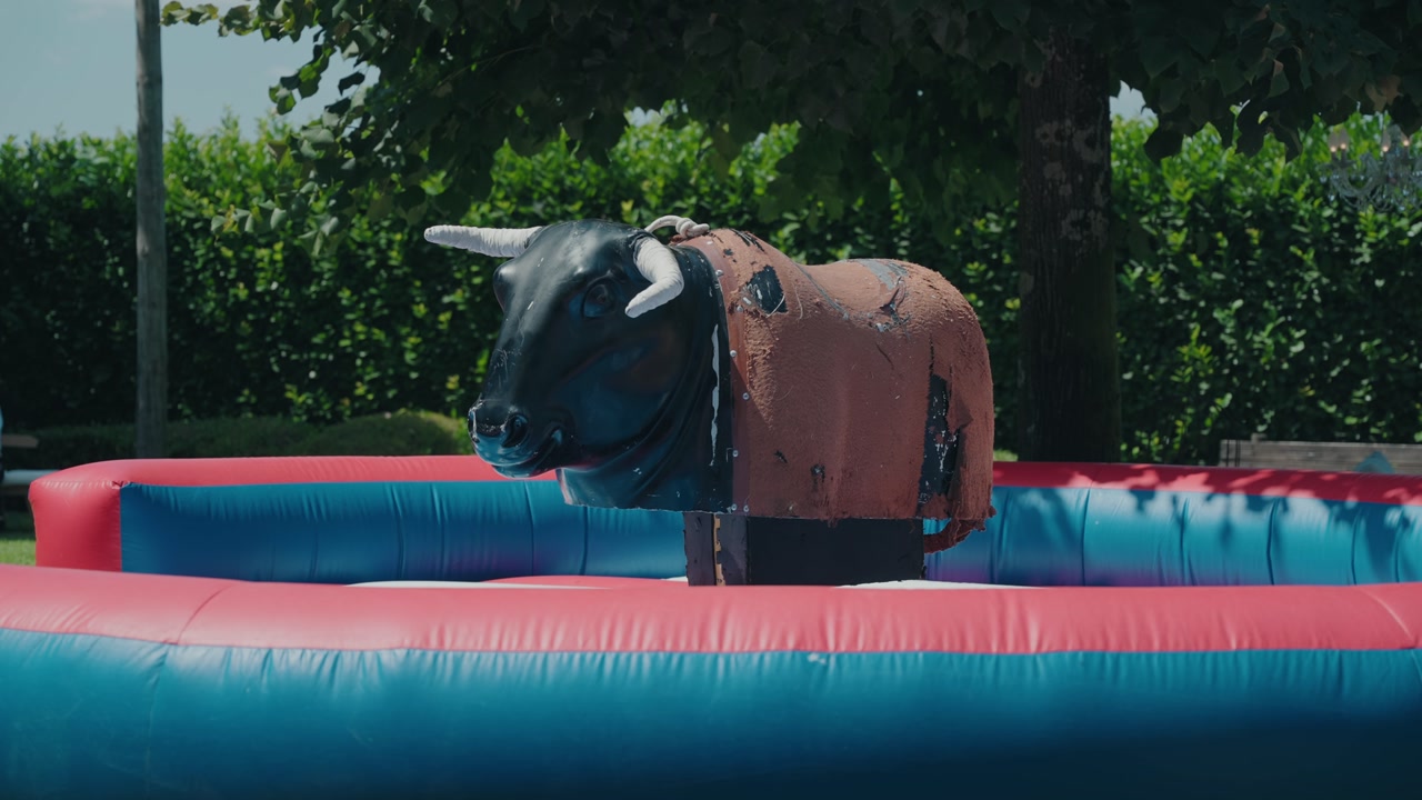 inflatable mechanical bull ride ready for outdoor fun and games