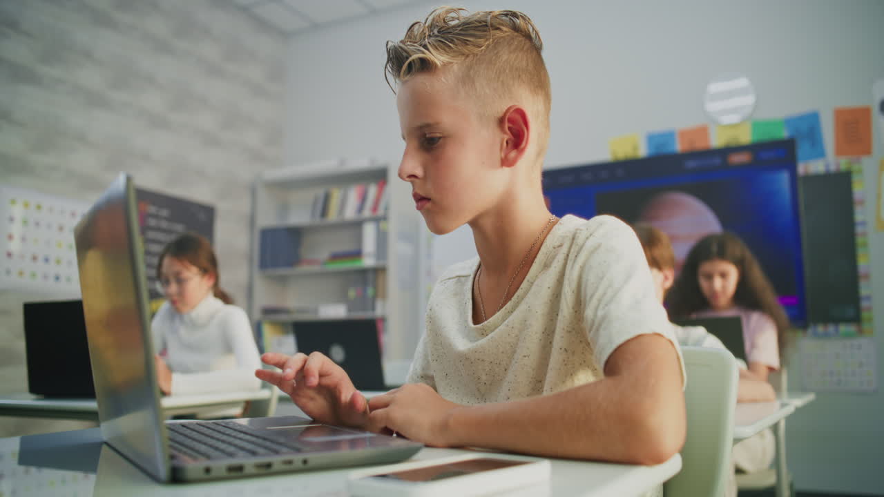 Primary School Boy Working on Creative Project on PC Monitor with Chroma Key During Digital Art