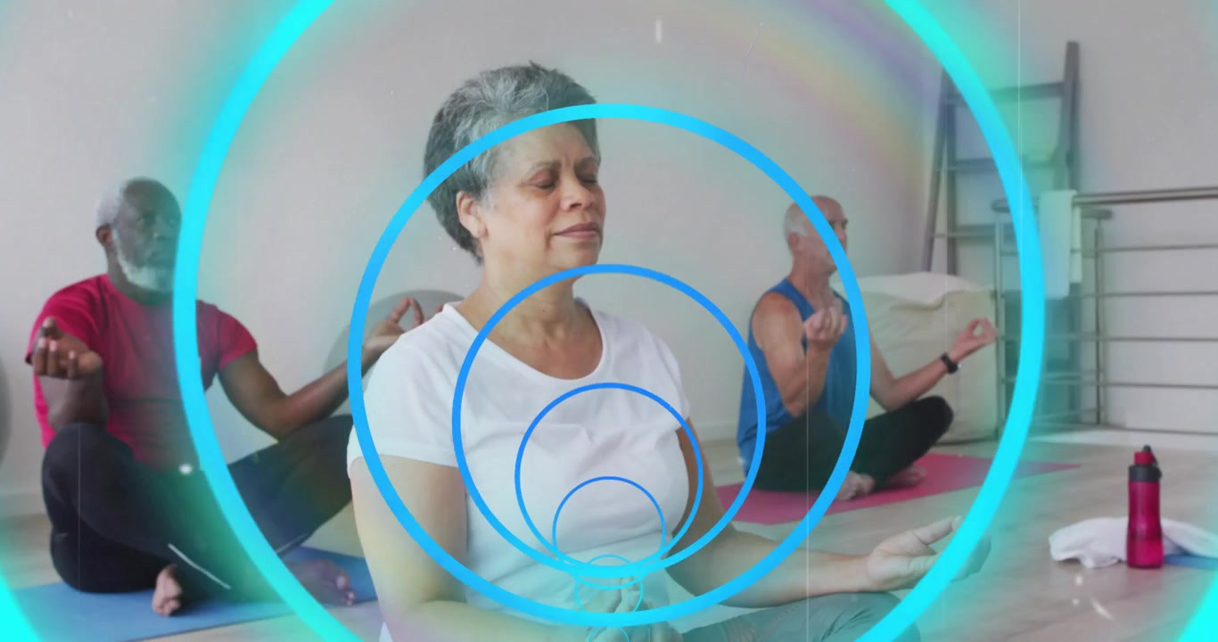 Gruppo benessere che medita su tappetini da yoga, sincronizzando il respiro mentre cerchi digitali pulsano intorno a loro.
