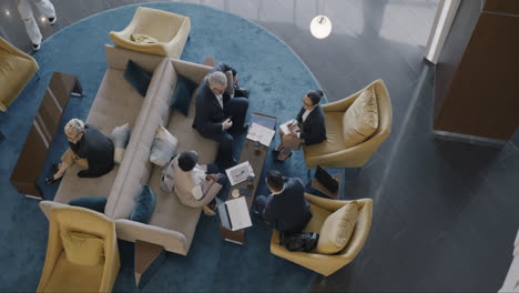 business meeting in hotel lobby