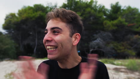 boy with facial mental tics changes expression outside in nature