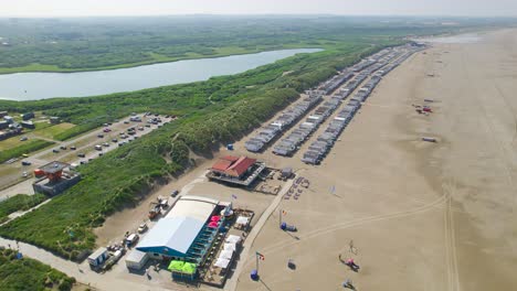 High-aerial-shot-over-beach-houses-in-the-Netherlands