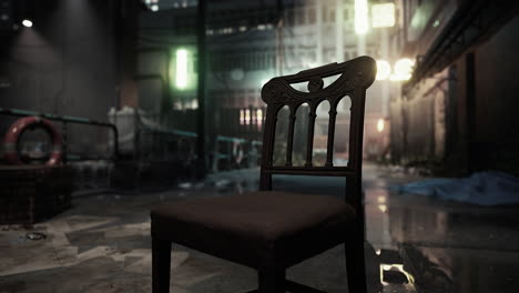 an old chair sits on a dark, empty street in a city