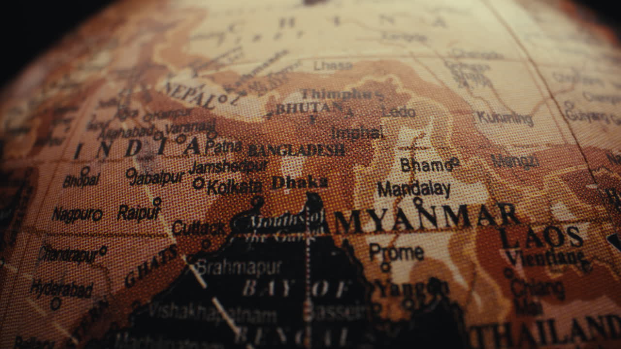 Close-up of a vintage world globe focusing on South Asia