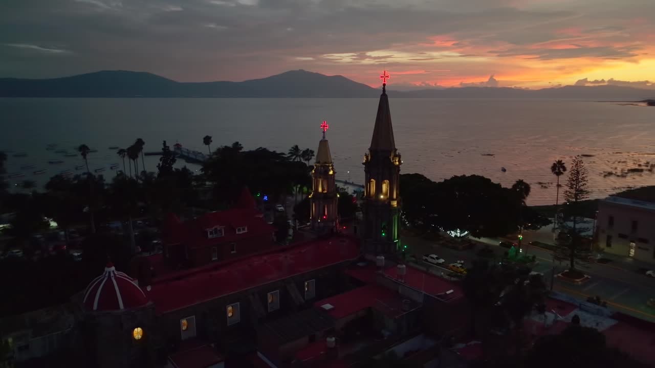 Aerial View of a Church at Night in a Lakeside Town in Mexico