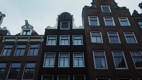 amsterdam canal houses on a rainy day